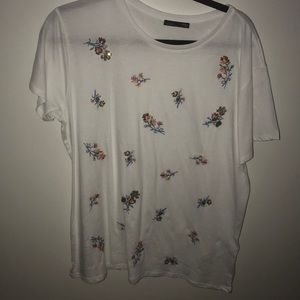 White top with flowers all over